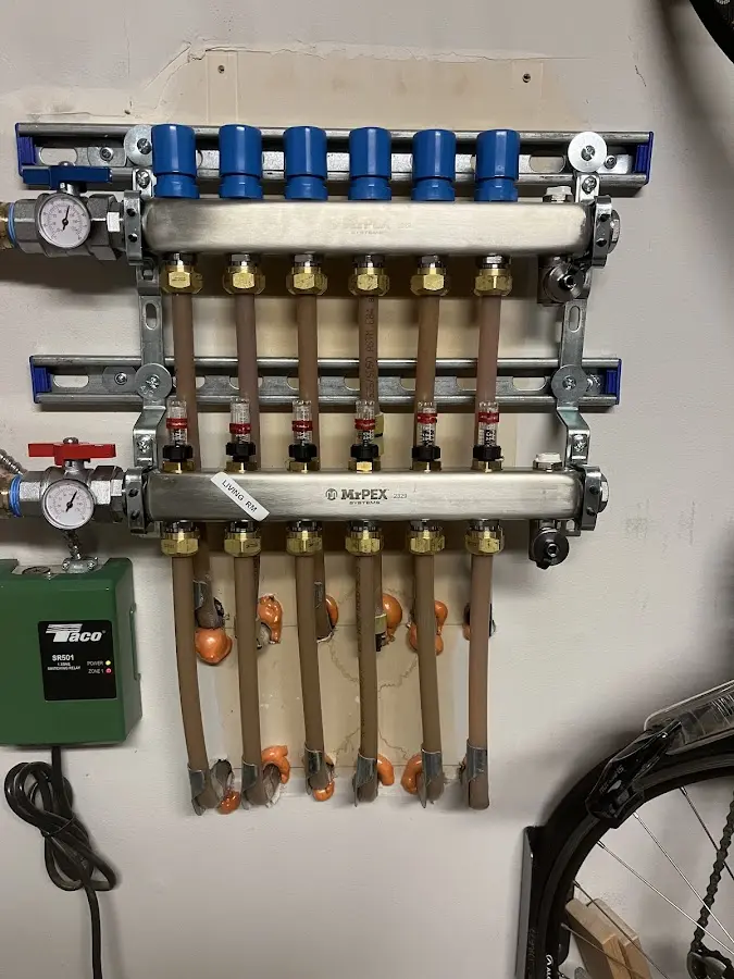 Plumber performing Water Heater Repair at a residential property in Walworth